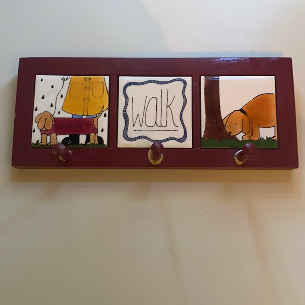 CUTE Vintage Dog rain coat and leash hook holder. Wood and tile.